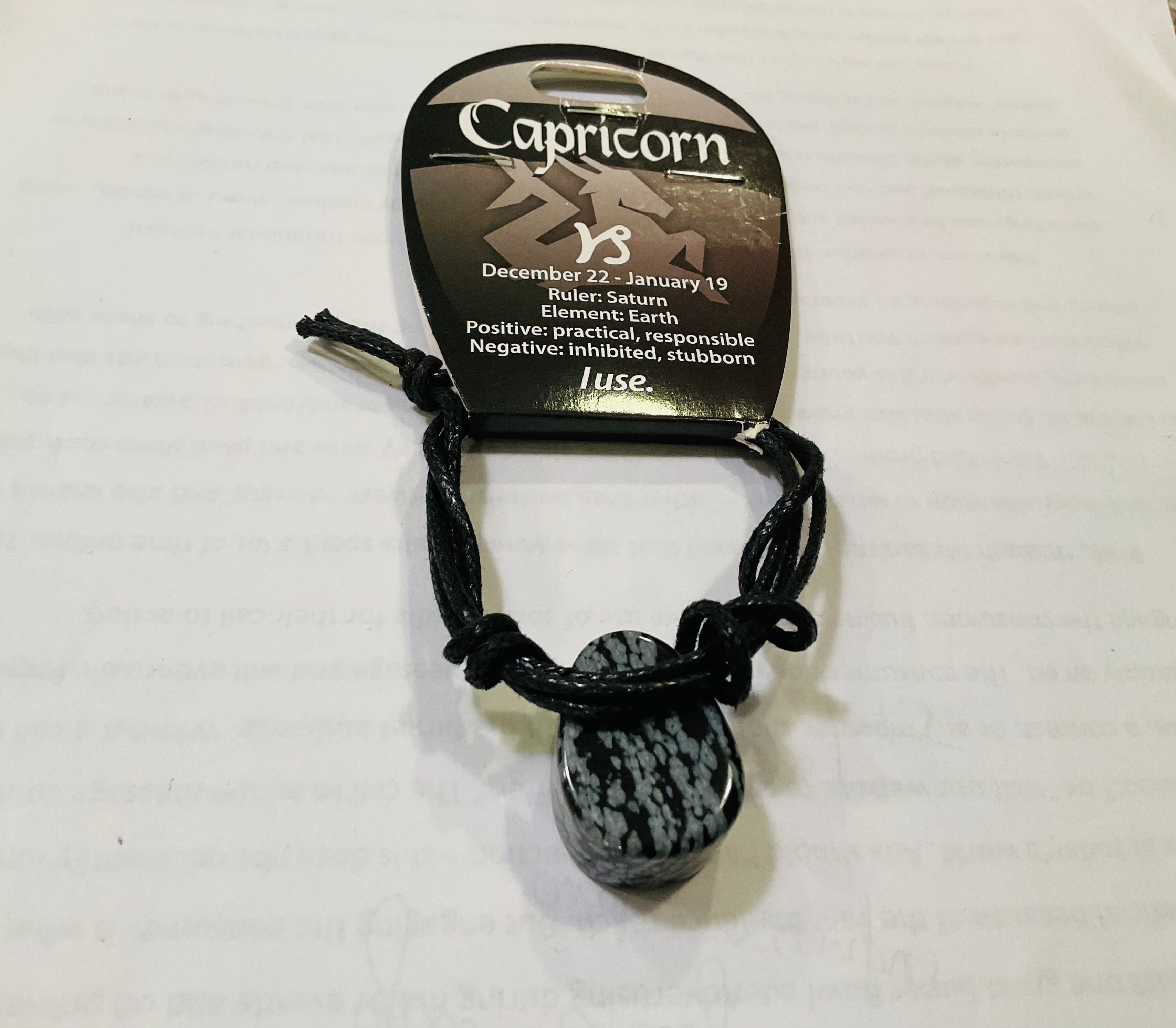 Capricorn snowflake obsidian pendant