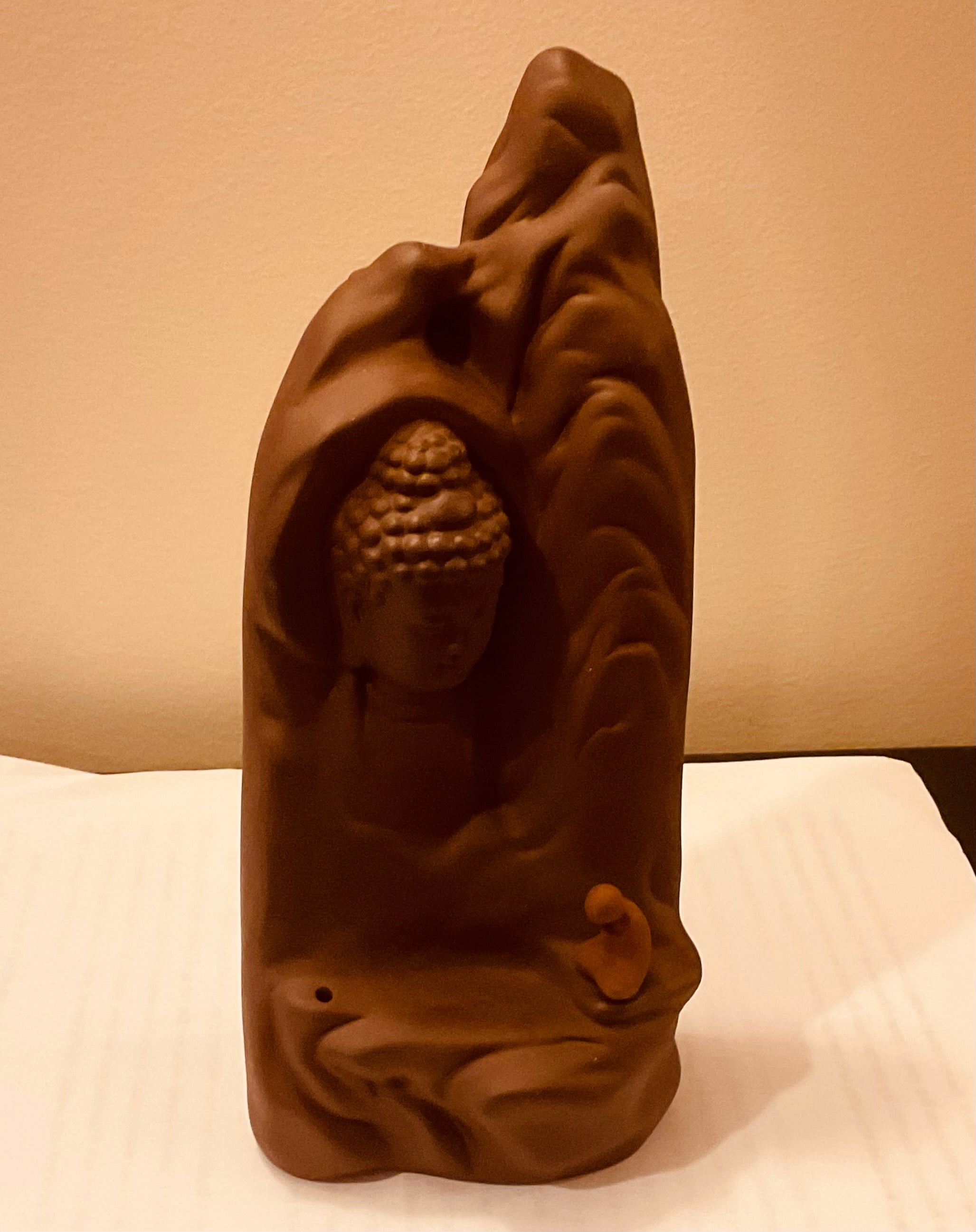 Buddha backflow burner