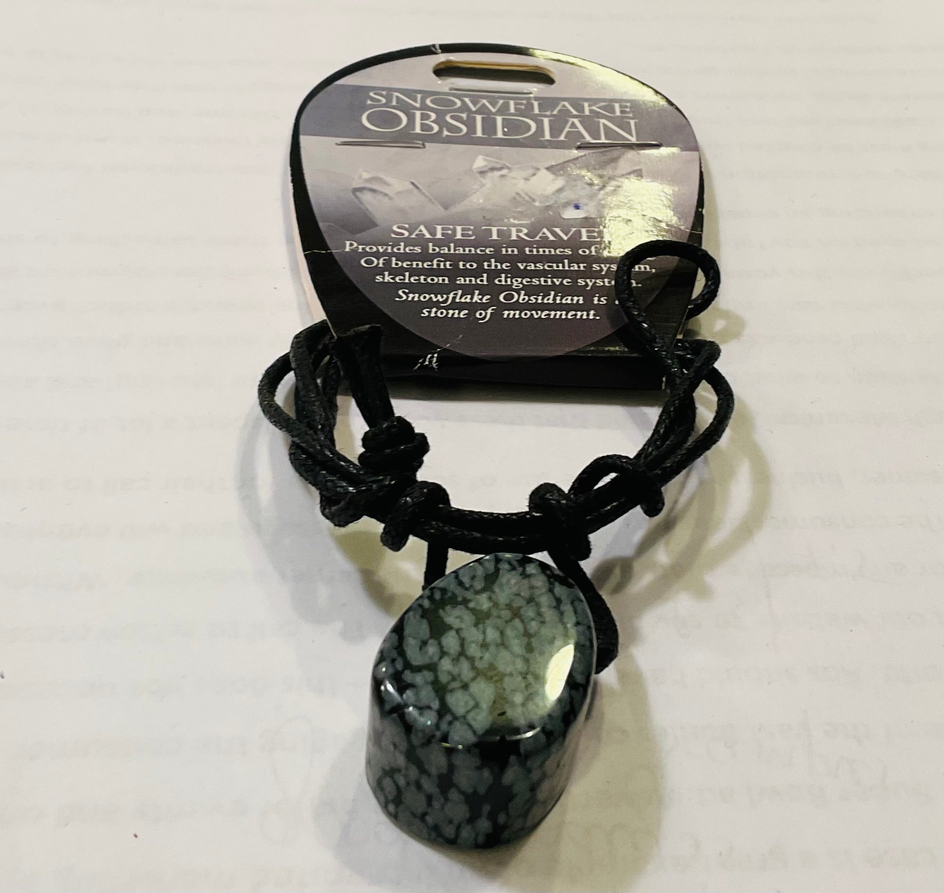 Snowflake obsidian safe travels pendant